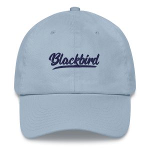 A light blue Dad Hat with the word "blackbird" embroidered in script font on the front.