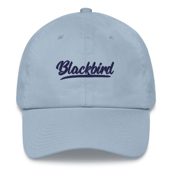 A light blue Dad Hat with the word "blackbird" embroidered in script font on the front.