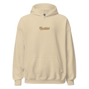 A plain beige Core Hoodie with the word "blackbird" embroidered in black script on the left chest area.